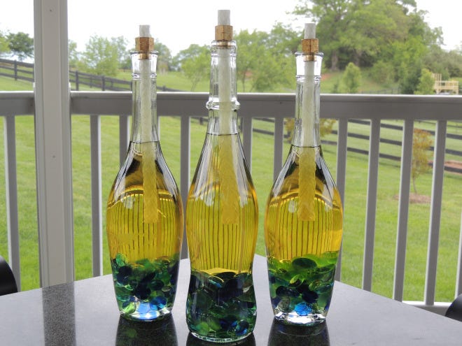 Wine Bottle Tiki Torches from The Armchair Sommelier Blog. 